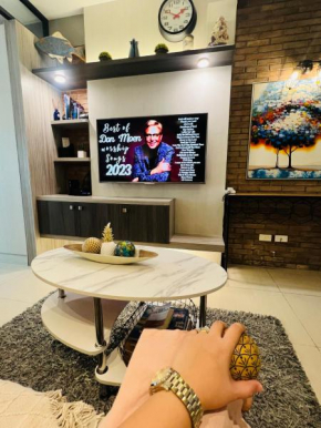 Aiza's Place in Shell Residences MOA
